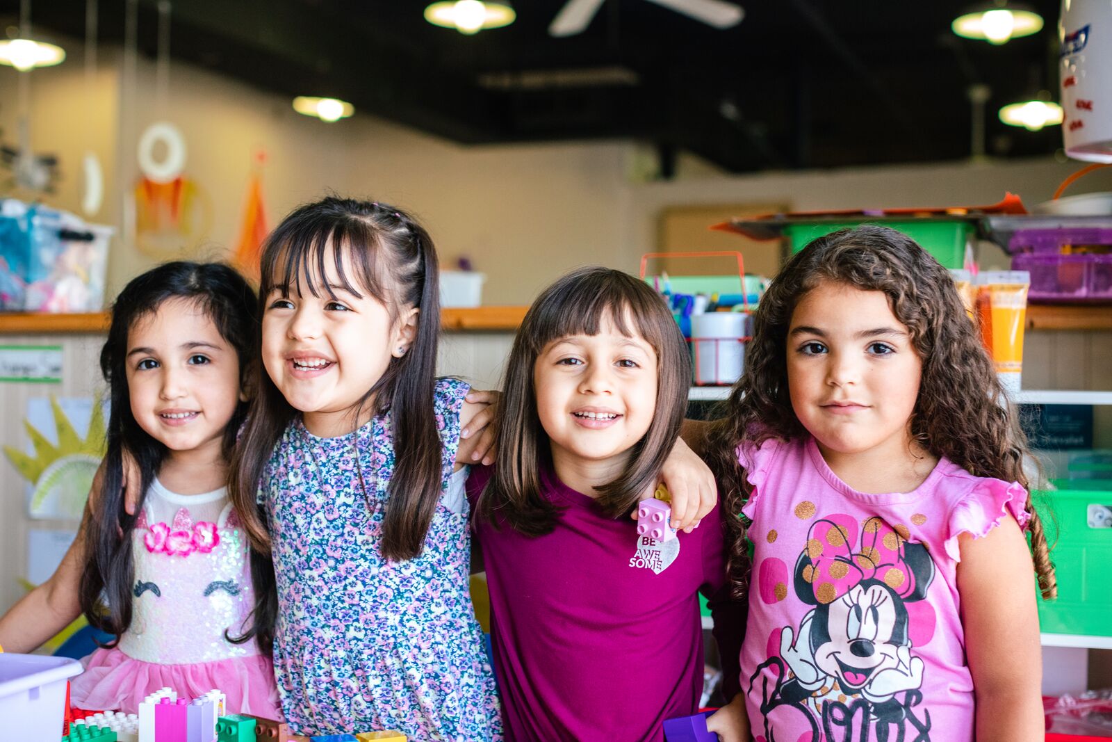 Four preschool students at the Osceola YMCA Learning Center