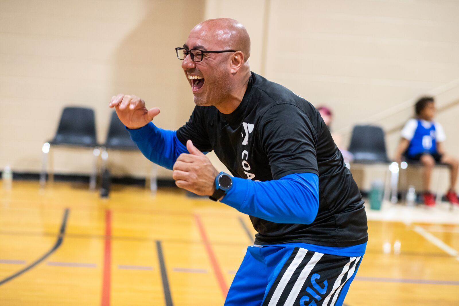 Sports Coach cheering for his team