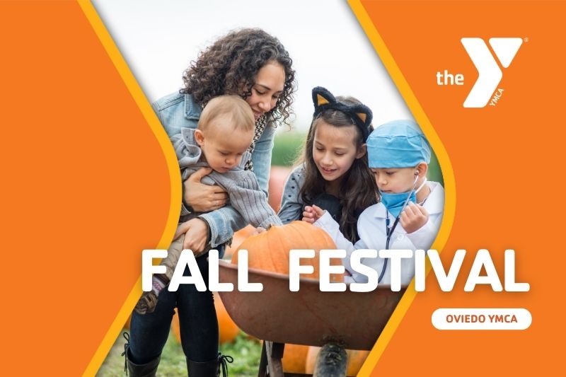 A family at a pumpkin patch during a Fall Festival